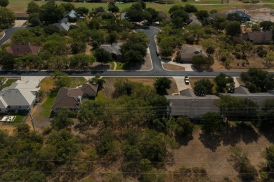 This lot is zone for a duplex so you could build live in one on Slick Rock Golf Course - Horseshoe Bay in Texas - for sale on GolfHomes.com, golf home, golf lot