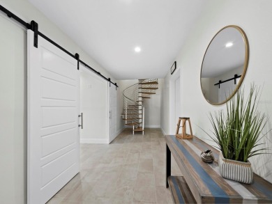 Located behind the gates of the prestigious Bay Isles, this on Longboat Key Golf Club Resort in Florida - for sale on GolfHomes.com, golf home, golf lot