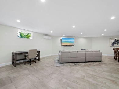 Located behind the gates of the prestigious Bay Isles, this on Longboat Key Golf Club Resort in Florida - for sale on GolfHomes.com, golf home, golf lot