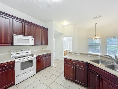 Welcome to 36730 Oconee, a golfer's paradise nestled in the on Black Bear Golf Club in Florida - for sale on GolfHomes.com, golf home, golf lot