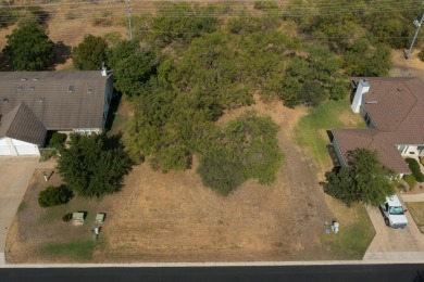 This lot is zone for a duplex so you could build live in one on Slick Rock Golf Course - Horseshoe Bay in Texas - for sale on GolfHomes.com, golf home, golf lot