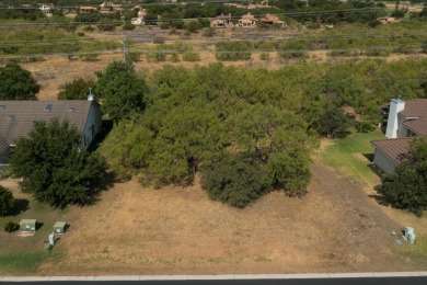 This lot is zone for a duplex so you could build live in one on Slick Rock Golf Course - Horseshoe Bay in Texas - for sale on GolfHomes.com, golf home, golf lot