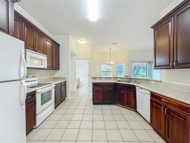 Welcome to 36730 Oconee, a golfer's paradise nestled in the on Black Bear Golf Club in Florida - for sale on GolfHomes.com, golf home, golf lot