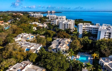 Located behind the gates of the prestigious Bay Isles, this on Longboat Key Golf Club Resort in Florida - for sale on GolfHomes.com, golf home, golf lot