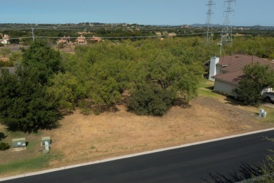 This lot is zone for a duplex so you could build live in one on Slick Rock Golf Course - Horseshoe Bay in Texas - for sale on GolfHomes.com, golf home, golf lot