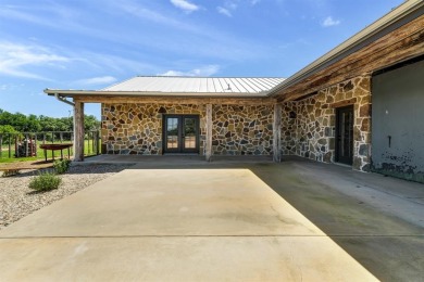 Experience comfort and modern western charm, an exquisite on Canyon West Golf Club in Texas - for sale on GolfHomes.com, golf home, golf lot