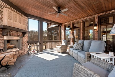 Nestled on a private .88-acre wooded lot in the prestigious on The River Club in Georgia - for sale on GolfHomes.com, golf home, golf lot