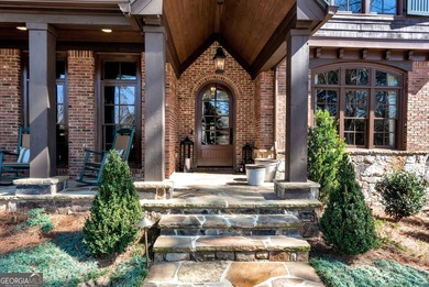 Nestled on a private .88-acre wooded lot in the prestigious on The River Club in Georgia - for sale on GolfHomes.com, golf home, golf lot