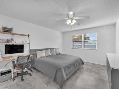 Step into elegance with this beautifully redesigned 2 bedroom on Wynmoor Golf Course in Florida - for sale on GolfHomes.com, golf home, golf lot