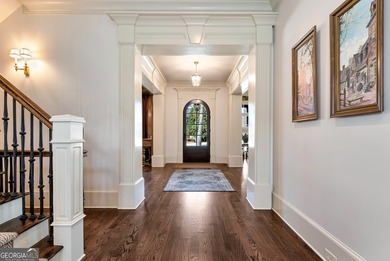 Nestled on a private .88-acre wooded lot in the prestigious on The River Club in Georgia - for sale on GolfHomes.com, golf home, golf lot