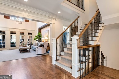 Nestled on a private .88-acre wooded lot in the prestigious on The River Club in Georgia - for sale on GolfHomes.com, golf home, golf lot