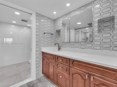 Step into elegance with this beautifully redesigned 2 bedroom on Wynmoor Golf Course in Florida - for sale on GolfHomes.com, golf home, golf lot