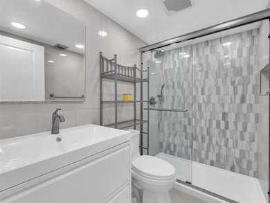 Step into elegance with this beautifully redesigned 2 bedroom on Wynmoor Golf Course in Florida - for sale on GolfHomes.com, golf home, golf lot