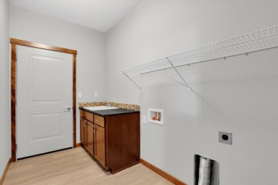 This beautifully designed 3 bed, 2 bath home offers style on Trailhead At Liberty Lake in Washington - for sale on GolfHomes.com, golf home, golf lot