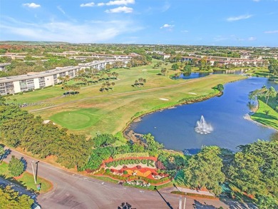 Step into elegance with this beautifully redesigned 2 bedroom on Wynmoor Golf Course in Florida - for sale on GolfHomes.com, golf home, golf lot
