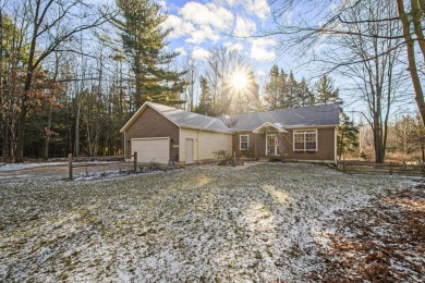 Prepare to fall in love with this captivating 5-bedroom on Canadian Lakes Country Club-The Royal Course in Michigan - for sale on GolfHomes.com, golf home, golf lot