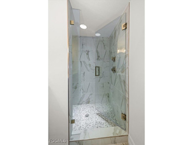 Experience comfortable Florida living in this sought-after on Kelly Greens Golf and Country Club in Florida - for sale on GolfHomes.com, golf home, golf lot