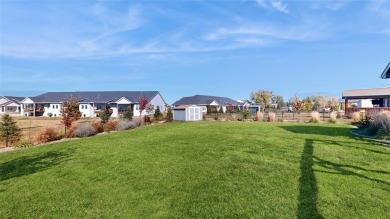 This coastal-inspired ranch home in Warrior Run Estates offers on Countryside Golf Course in Iowa - for sale on GolfHomes.com, golf home, golf lot