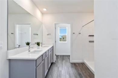 Modern comfort meets exceptional community living in this on Esplanade Golf and Country at Lakewood Ranch in Florida - for sale on GolfHomes.com, golf home, golf lot