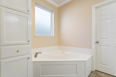 Welcome Home to Comfort, Space, and an Exceptional Location in on The Lake Country Club - Lake Waco in Texas - for sale on GolfHomes.com, golf home, golf lot