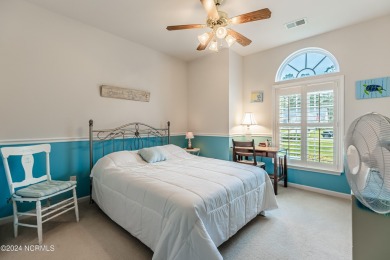 Discover this spacious 3-bedroom home with stunning pond views on Sandpiper Bay Golf and Country Club in North Carolina - for sale on GolfHomes.com, golf home, golf lot