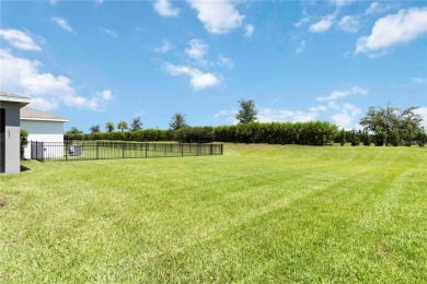 Modern comfort meets exceptional community living in this on Esplanade Golf and Country at Lakewood Ranch in Florida - for sale on GolfHomes.com, golf home, golf lot
