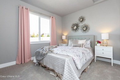 The Kingston has a large chef's kitchen with island, a spacious on Prairie Falls Golf Club in Idaho - for sale on GolfHomes.com, golf home, golf lot