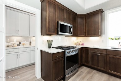 The Kingston has a large chef's kitchen with island, a spacious on Prairie Falls Golf Club in Idaho - for sale on GolfHomes.com, golf home, golf lot