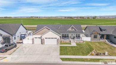 Experience luxury living in this exceptional 2023 home in on Sage Lakes Municipal Golf Course in Idaho - for sale on GolfHomes.com, golf home, golf lot