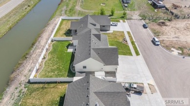 Experience luxury living in this exceptional 2023 home in on Sage Lakes Municipal Golf Course in Idaho - for sale on GolfHomes.com, golf home, golf lot
