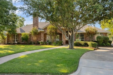Nestled in a serene location backing up to the Lake Waco Golf on The Lake Country Club - Lake Waco in Texas - for sale on GolfHomes.com, golf home, golf lot