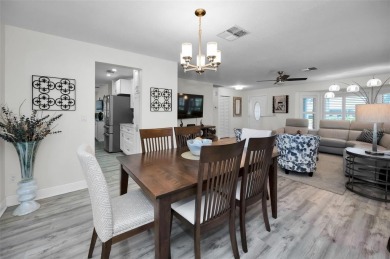 BEAUTIFULLY REMODELED and UPDATED home nestled in the highly on Highland Lakes Executive Golf Course in Florida - for sale on GolfHomes.com, golf home, golf lot