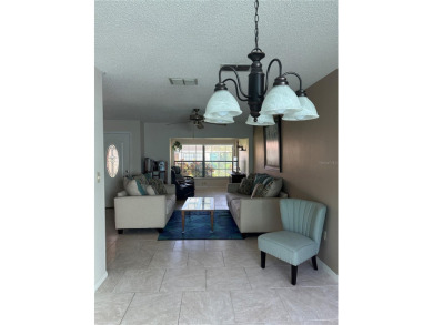 Welcome Home!  This charming 2 BR, 2 BA, 1 car garage is move-in on River Ridge Golf Club in Florida - for sale on GolfHomes.com, golf home, golf lot