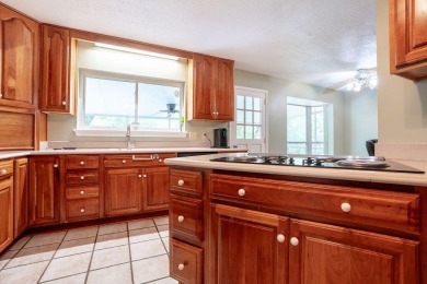 Lakefront living with a pool in Kenwood! This spacious home at on Fort Walton Beach Golf Course in Florida - for sale on GolfHomes.com, golf home, golf lot