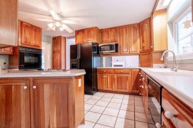 Lakefront living with a pool in Kenwood! This spacious home at on Fort Walton Beach Golf Course in Florida - for sale on GolfHomes.com, golf home, golf lot