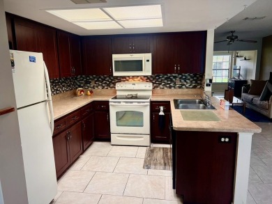 Welcome Home!  This charming 2 BR, 2 BA, 1 car garage is move-in on River Ridge Golf Club in Florida - for sale on GolfHomes.com, golf home, golf lot