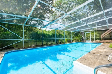 Lakefront living with a pool in Kenwood! This spacious home at on Fort Walton Beach Golf Course in Florida - for sale on GolfHomes.com, golf home, golf lot