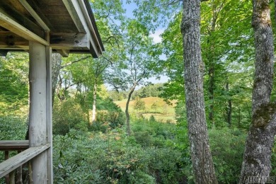 Nestled in the esteemed Wade Hampton Golf Club, this home offers on Headwaters Golf Club in North Carolina - for sale on GolfHomes.com, golf home, golf lot