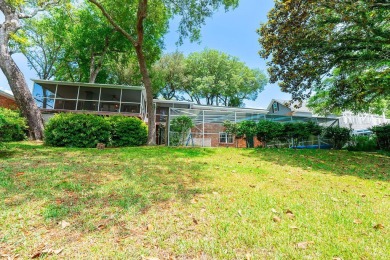 Lakefront living with a pool in Kenwood! This spacious home at on Fort Walton Beach Golf Course in Florida - for sale on GolfHomes.com, golf home, golf lot