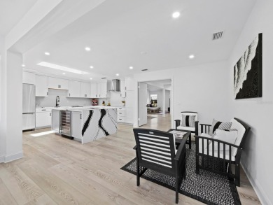 Located in the quiet, gated community of Bay Isles on Longboat on Longboat Key Golf Club Resort in Florida - for sale on GolfHomes.com, golf home, golf lot