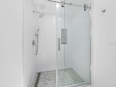 Located in the quiet, gated community of Bay Isles on Longboat on Longboat Key Golf Club Resort in Florida - for sale on GolfHomes.com, golf home, golf lot