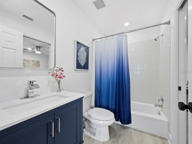 Located in the quiet, gated community of Bay Isles on Longboat on Longboat Key Golf Club Resort in Florida - for sale on GolfHomes.com, golf home, golf lot