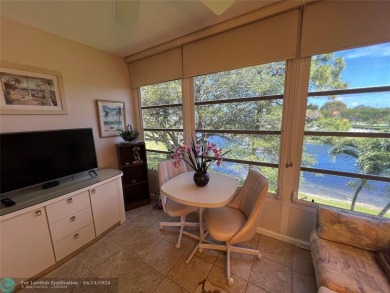GORGEOUS WATER & FOUNTAINVIEW FROM THIS ONE BEDROOM, TWO FULL on Hillsboro Pines Golf in Florida - for sale on GolfHomes.com, golf home, golf lot