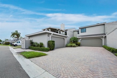 Located in the quiet, gated community of Bay Isles on Longboat on Longboat Key Golf Club Resort in Florida - for sale on GolfHomes.com, golf home, golf lot