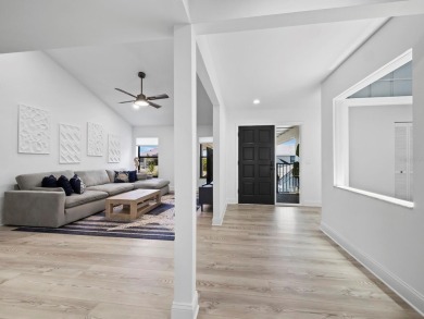 Located in the quiet, gated community of Bay Isles on Longboat on Longboat Key Golf Club Resort in Florida - for sale on GolfHomes.com, golf home, golf lot