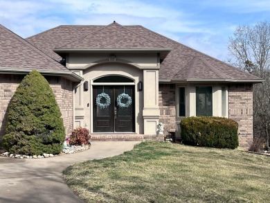 This elegant, yet comfortable, single family home sits on the on Ledgestone Country Club and Golf Course in Missouri - for sale on GolfHomes.com, golf home, golf lot
