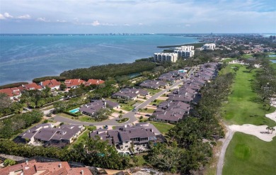 Located in the quiet, gated community of Bay Isles on Longboat on Longboat Key Golf Club Resort in Florida - for sale on GolfHomes.com, golf home, golf lot