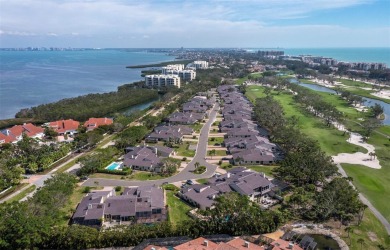 Located in the quiet, gated community of Bay Isles on Longboat on Longboat Key Golf Club Resort in Florida - for sale on GolfHomes.com, golf home, golf lot