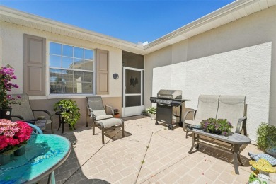 Welcome to this charming home nestled on a serene conservation on Scepter Golf Club in Florida - for sale on GolfHomes.com, golf home, golf lot