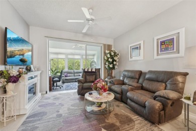 Welcome to this charming home nestled on a serene conservation on Scepter Golf Club in Florida - for sale on GolfHomes.com, golf home, golf lot